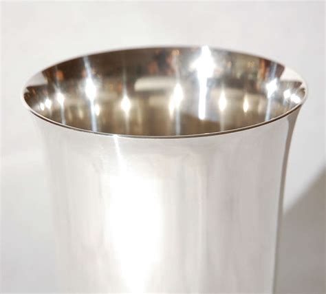 hermes silver plate vase.